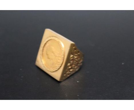 A HALLMARKED 9 CARAT GOLD RING SET WITH A QUEEN VICTORIA SOVEREIGN, in a 'squared' setting, approx weight 20.4g Condition -&n