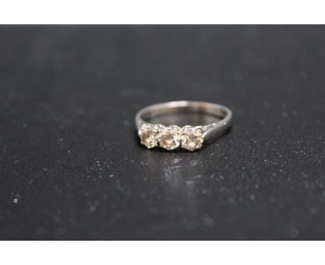 A HALLMARKED 18 CARAT GOLD DIAMOND TRILOGY RING, each diamond being of an estimated quarter carat, approx weight 4.4g, ring s