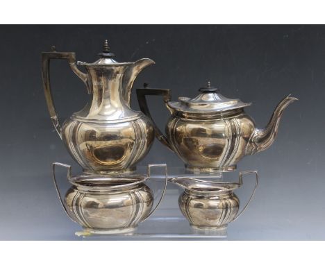 A HEAVY HALLMARKED SILVER FOUR PIECE TEA SERVICE BY JAMES DEAKIN &amp; SONS - SHEFFILED 1918, retailed by E H Lawley &amp; So