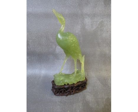 A CHINESE JADE STORK ON WOODEN BASE, H 16.5 cm, include base H 20 cm