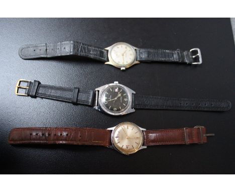 TWO SERVICES WATCHES, one with black face, together with a Junghans watch, average Dia. 3 cm (3)