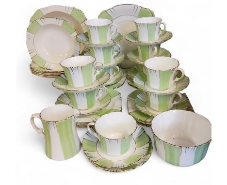 A Heathcote China Art Deco&nbsp; tea service, comprising two bread and butter plates, fruit bowls and side bowls, eleven cups