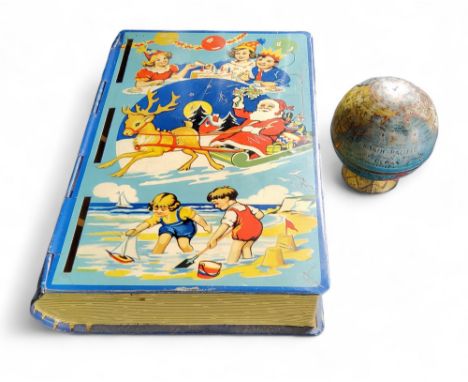 A Chad Valley novelty tin plate money box, in the form of a book, Happy Days, 14cm high;&nbsp; a tinplate globe pencil sharpe