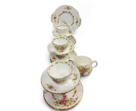A Mintons Lorraine pattern tea service, for six, comprising cups, saucers, side plates, milk jug, bread and butter plate, pri