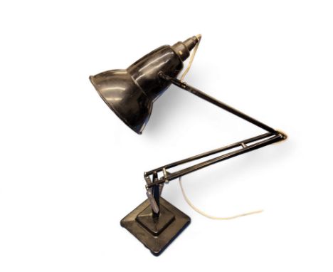 A Herbert Terry Anglepoise lamp in black, three spring stepped base, 93cm high 