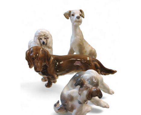 A Lladro model, of a Setter, 458319cm high;&nbsp; a Royal Doulton model,&nbsp; of a French Poodle, printed mark,&nbsp; HN2631
