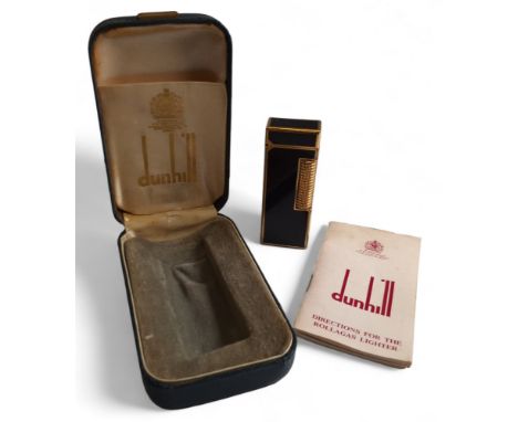 A Dunhill Rollagas gold plated and black lacquer lighter, original box and instructions 