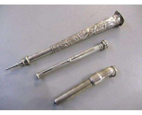 Three Morden &amp; Co silver retractable pencils, one embossed with figures and scrolls, one with engine turned decoration an