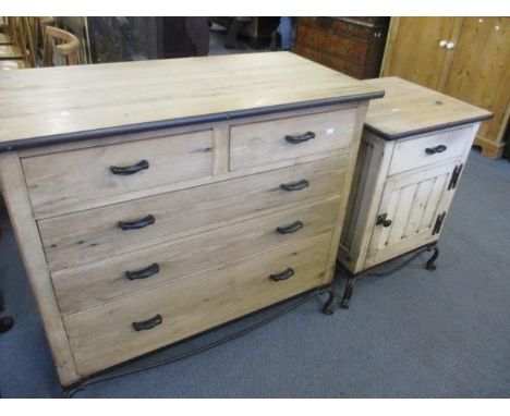 An Arts &amp; Crafts style light wood and metal Chaumont chest of two short and three long drawers, together with a matching 