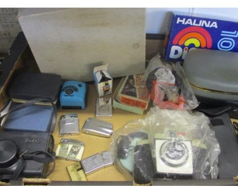 A mixed lot to include various cameras, razors, a lighter and a leather cased gentleman's vanity set 