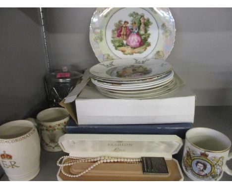 A mixed lot include a boxed Royal Worcester plate, commemorative cups and other items 