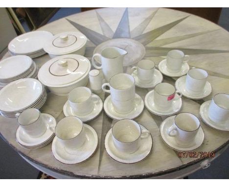 A vintage Poole pottery dinner service, possibly 'Parkstone'. 