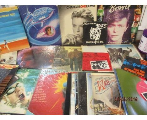 A collection of late 20th century LPs to include David Bowie, Bob Dylan, Supertramp and Elvis Costello, together with late 20