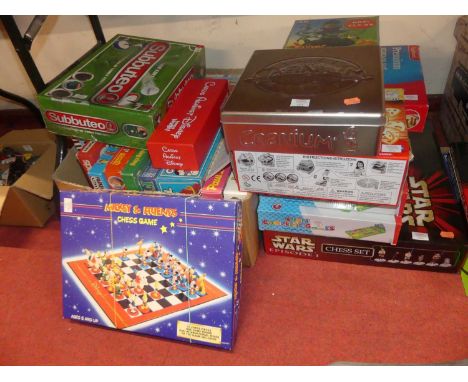 A quantity of various boxed games to include Star Wars Chess set, Subbuteo box set, Mousetrap, Cranium, etc