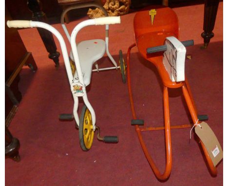 A child's mid-20th century painted rocking horse, together with a similar vintage child's painted tricycle (2)