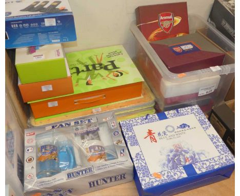 A box containing a small quantity of Arsenal membership boxes, a ceramic and glassware gift set, various wifi hubs etc