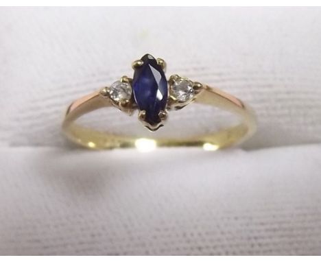 An 18 carat gold sapphire and diamond set ring 