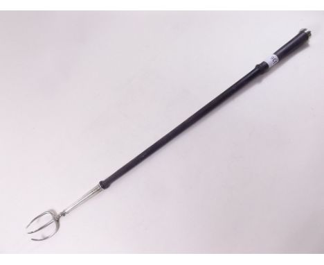 A silver and ebony toasting fork, 58cm long - London 1907 by Daniel & John Welby 