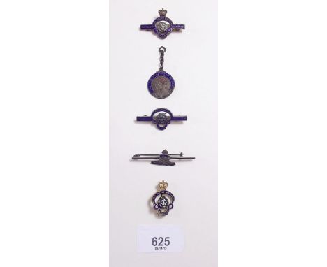 A silver Royal Artillery brooch, three enamel badges and a medal 