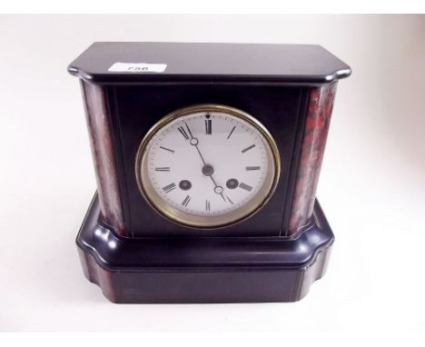 A Victorian black and red slate mantel clock 