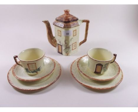 A Keele Pottery cottage ware tea service comprising: teapot, hot water, jug, sugar, six cups and saucers and six tea plates
