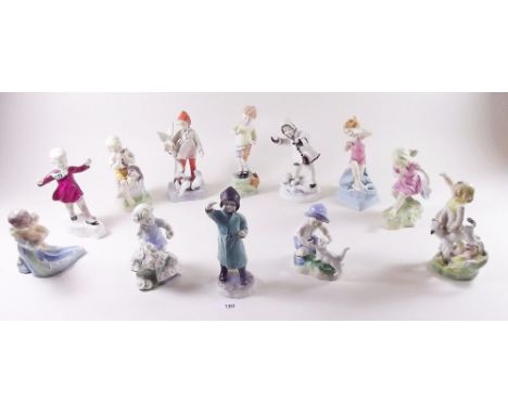 A Royal Worcester set of twelve figures by F G Doughty 'The Months of the Year'