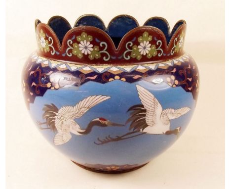 A Japanese cloisonne enamel jardiniere decorated panels of cranes and flowers