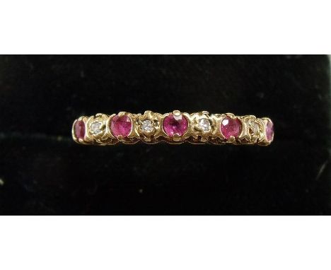 A 9 carat gold ruby and diamond ring 