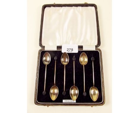 A harlequin set of six silver and enamel coffee spoons, Birmingham 1930, cased