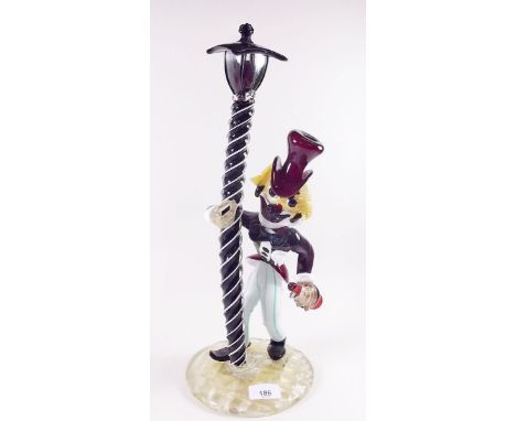 A Murano large glass clown with lamp post - 44cm high 