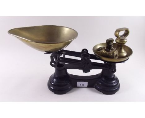 A set of kitchen scales and weights 