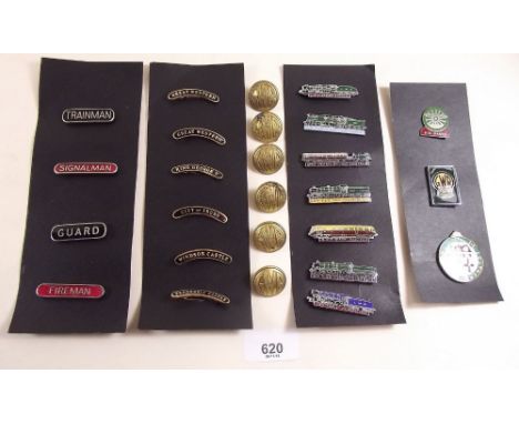 A collection of enamel railway badges and buttons 