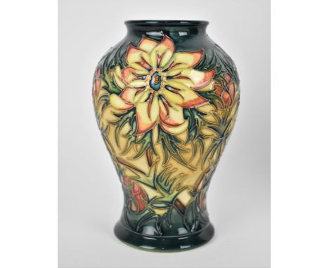 A Moorcroft ceramic vase designed by Nicola Slaney in the 'Spike' pattern, of baluster form with tubelined floral decoration 