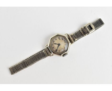 An early 20th century ladies 18ct white gold cased manual wind wristwatch having Arabic numerals and blued hands, the movemen