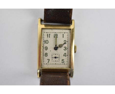 A gents circa 1926 9ct gold cased manual wind Rolex wristwatch having a unsigned rectangular white enamelled dial with Arabic