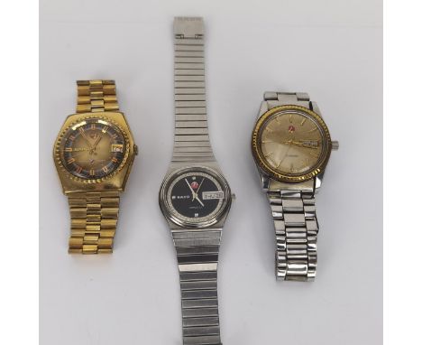 A group of three gents Automatic Rado wristwatches to include two stainless steel Rado Day/Date Voyagers, one set with white 