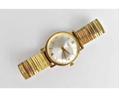 A vintage gents, tested as 9ct gold, cased manual winding wristwatch having a silvered dial with baton and Arabic numerals an