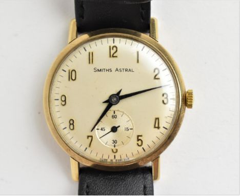 A vintage gents 9ct gold cased manual wind Smiths-Astral wristwatch having a silvered dial with Arabic numerals and subsidiar