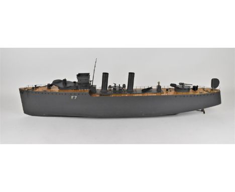 A large scale Bassett-Lowke model of a 1930s F7 class destroyer battleship, battery operated, wooden hull painted in naval gr