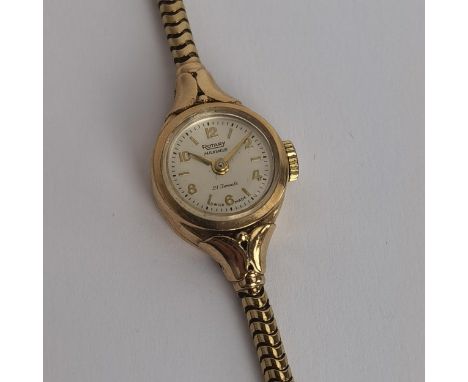 A vintage ladies 9ct gold cased manual wind Rotary wristwatch having a silvered dial, signed Rotary Maximus 21 jewel, with Ar