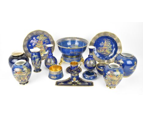 A collection of early 20th century Carlton Ware in the New Mikado pattern, comprising a large bowl on stand, a pair of plates