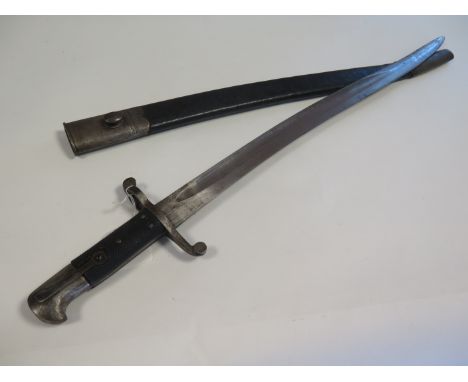 Bayonet: A Pattern 1856 Volunteer sword bayonet with VR Cypher & Crown to ricasso. Clean blade 22.75" marked 'S.Y.' In its st