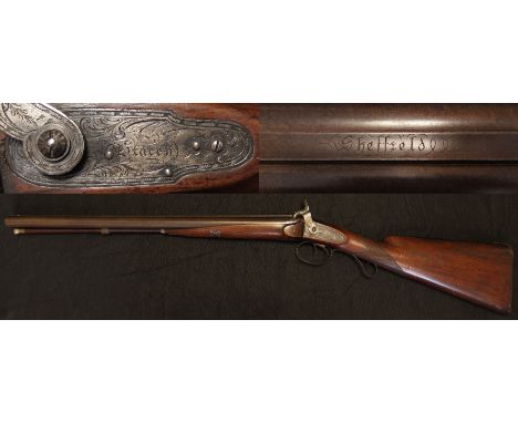 Percussion shotgun: A good quality percussion shotgun of 10 bore. Barrels 21.5", centre rib signed 'Sheffield'. Lockplate sig