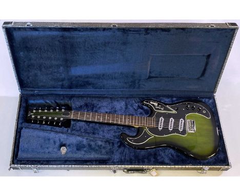 A Burns London 'Club Series' 12 string electric guitar. Serial number:20080091. Excellent condition. With hard case. Includes