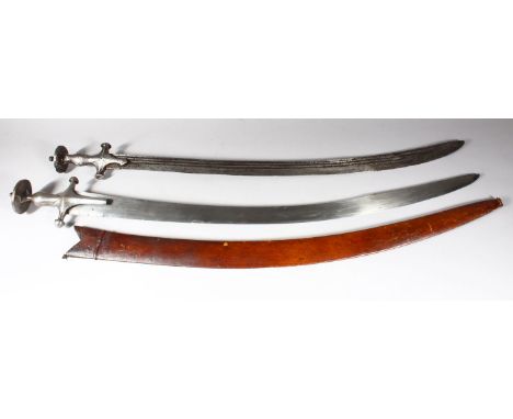 A 19TH CENTURY INDIAN TULWAR, with steel hilt and leather scabbard, together with a similar sword without scabbard, 96cm and 