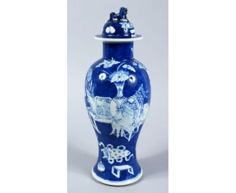 A GOOD 19TH CENTURY CHINESE BLUE &amp; WHITE PORCELAIN BALUSTER VASE &amp; COVER, the body decorated with precious objects an