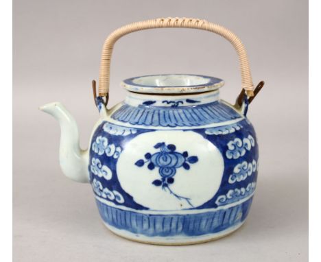 A 19TH CENTURY CHINESE BLUE &amp; WHITE PORCELAIN TEAPOT &amp; COVER, the teapot decorated with panels of flora amongst cloud