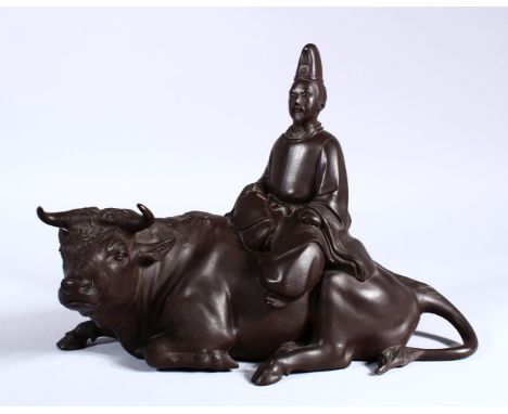 A GOOD JAPANESE MEIJI PERIOD BRONZE OKIMONO - OXEN &amp; ATTENDANT, the bronze okimono in a recumbent position looking aside,