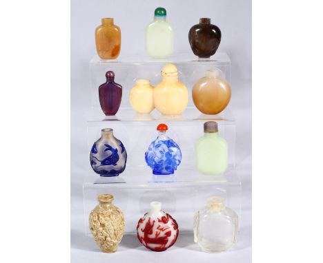 A MIXED LOT OF 19TH / 20TH CENTURY CHINESE SNUFF BOTTLES, the lot consisting of four overlay glass /  peking glass bottles, o
