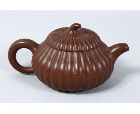 A GOOD 20TH CENTURY CHINESE YIXING CLAY TEAPOT, the teapot in moulded form of a pumpkin, the base and underside of the lid wi